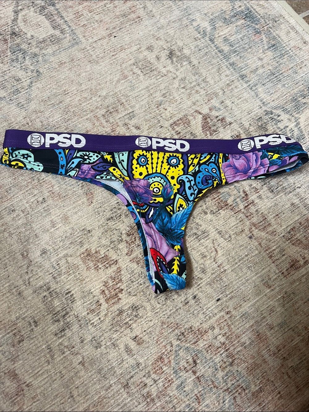 PSD Purple-Waistband Thong. New. Size small.
